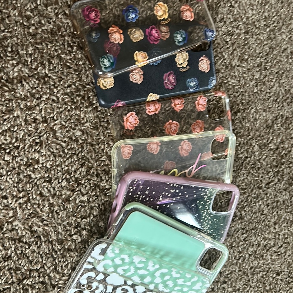 iPhone 11 cases. The 3 floral ones are coach and otter box